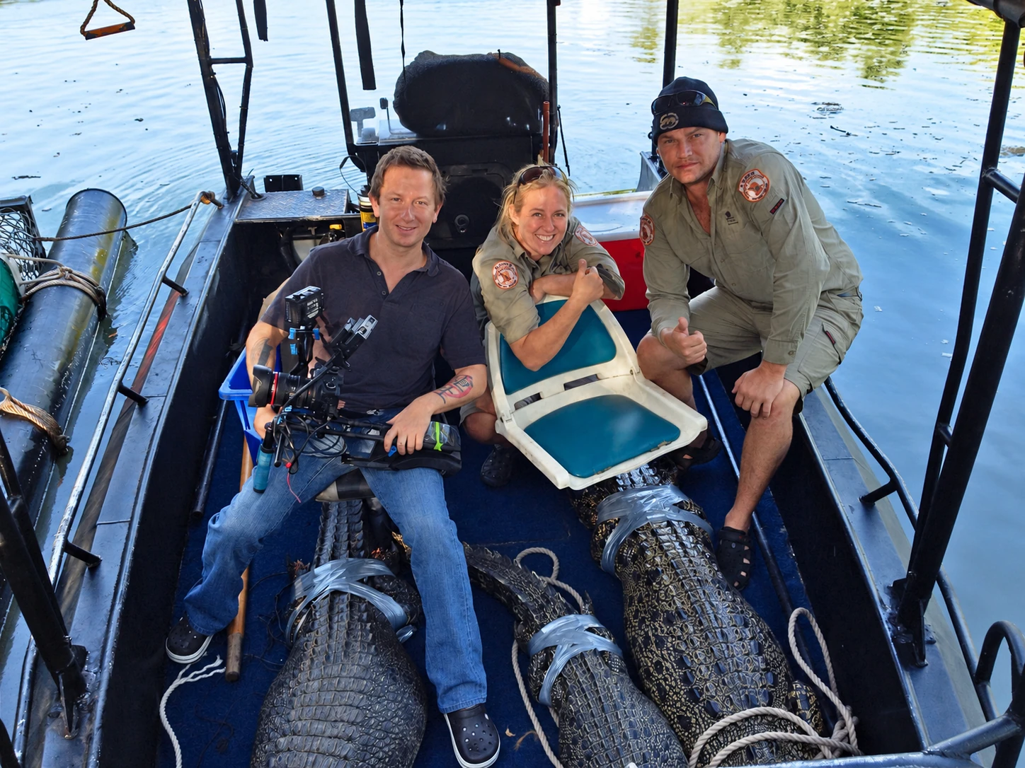 Sergio Myers with camera equipment and the crocodile-management team during Croc Catchers NT field production.